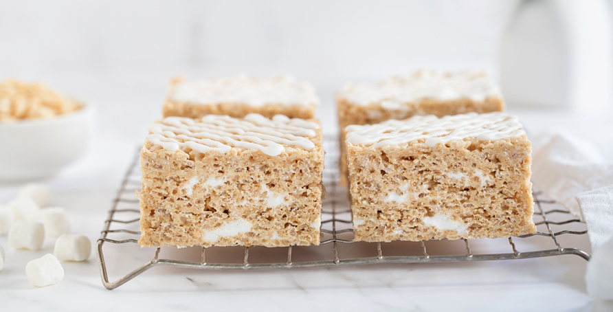 Brown Butter Rice Krispie Treats on cooling rack with coffee